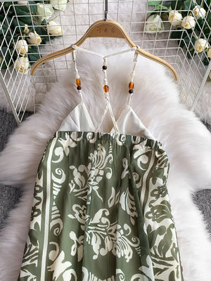 Dual-pattern V-neck cami dress with beaded straps and a green floral print.