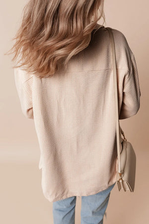 Beige textured corduroy oversized utility jacket with a casual fit.