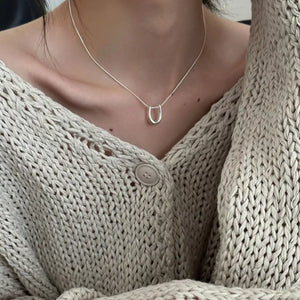 Sterling silver U-shaped pendant necklace on a delicate chain