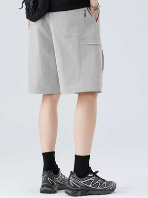 Men's light gray cargo shorts with multiple pockets and a relaxed fit.