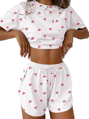 White cherry print pajama set with crop top and drawstring shorts