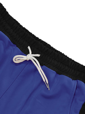 Men's royal blue sweatpants with black waistband and white drawstring detail.