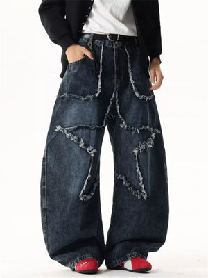 Star Patchwork Distressed Wide Leg Jeans in dark wash cotton with frayed details.
