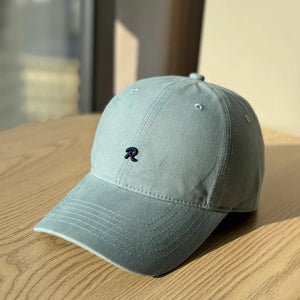 Light blue baseball cap with embroidered R detail