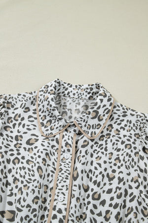 Print Button-down Midi Dress with leopard print, Peter Pan collar, and button detail.