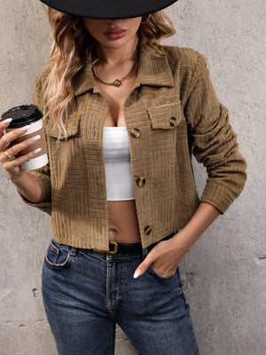 Caramel textured corduroy cropped utility jacket with button details and chest pockets.