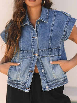 Boxy medium wash denim vest with button front, collar, and shoulder detail.