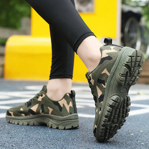 Camouflage mesh performance trainers in moss green with a textured sole.