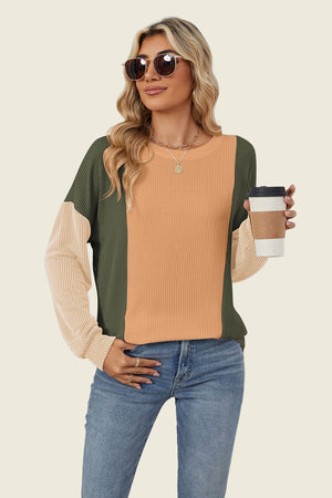 Colorblock waffle knit pullover with crew neck and long sleeves in green, tan, and cream.