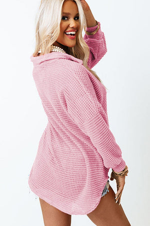 Blush pink waffle knit button-down shirt jacket with a relaxed fit.
