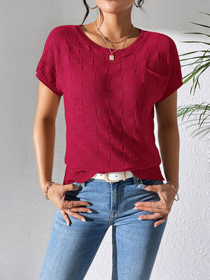 Burgundy knit pocket tee with a textured check pattern and short sleeves.