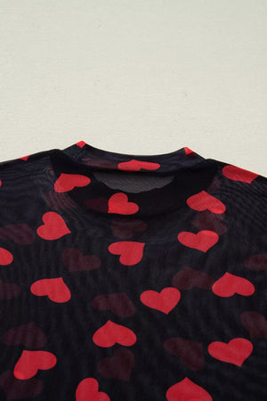 Black sheer mesh top with red heart print and mock neck