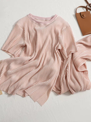 Elegant pink pleated two-piece set with short sleeves and a round neckline.