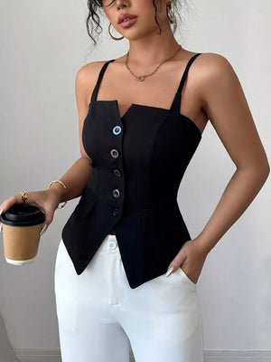 Black button front cami with square neckline and asymmetrical hem, styled with white pants.