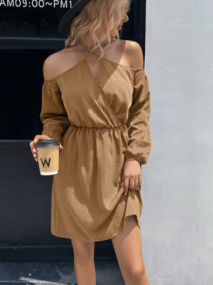 Khaki cross-strap off-shoulder mini dress with long sleeves and elastic waist.