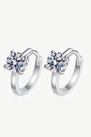 Silver hoop earrings with a solitaire diamond halo and a 925 silver band.