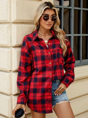 Distressed plaid overshirt in deep red and black with a relaxed fit and button front.
