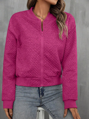 Diamond quilted bomber jacket in deep rose with zip closure and ribbed cuffs and hem.