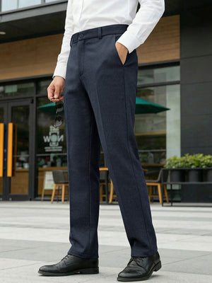 Men's navy classic fit dress pants with pockets, styled with a white dress shirt.