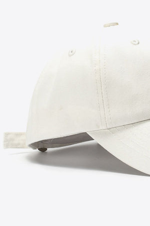 Beige cotton baseball cap with adjustable strap detail
