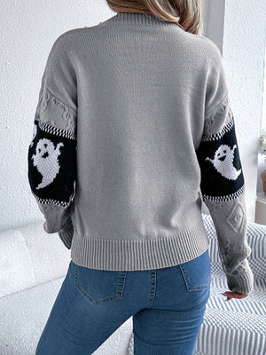 Gray knit crewneck sweater with ghost motif on sleeves, cable knit details.