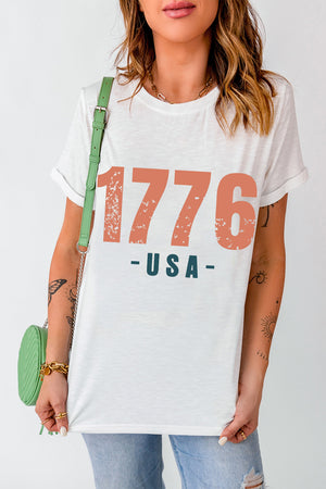 White t-shirt with distressed 1776 USA graphic, crew neck, short sleeves.