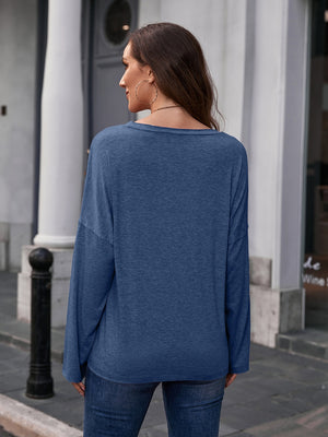 Dusty blue slouchy long sleeve tee with relaxed fit and scoop neck.