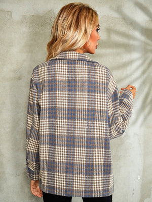 Checkered collared jacket in blue and brown plaid with button closure.