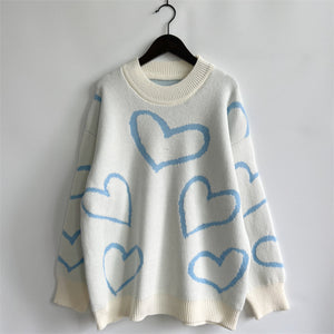 Heart Outline Knit Sweater in Pastel Blue with crewneck and long sleeves.