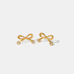 Gold cubic zirconia bow stud earrings with clear stones
