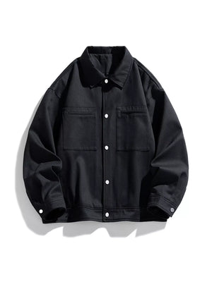 Black oversized casual snap jacket with two chest pockets and button closure
