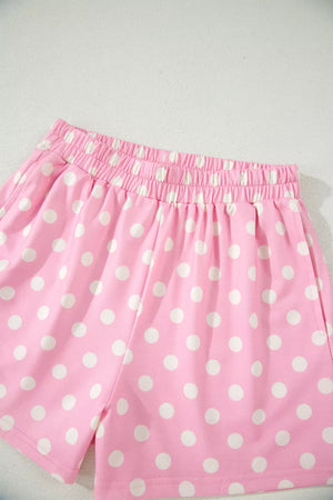 Pink polka dot shorts with elastic waistband, polyester fabric