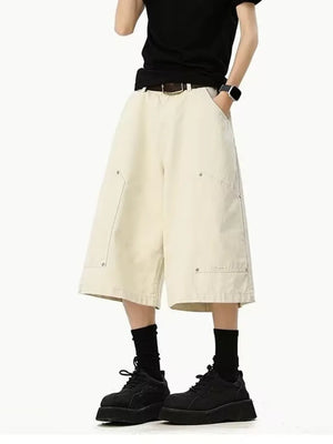 Relaxed fit utility cargo shorts in apricot with below-knee length and contrast stitching.