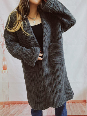 Chunky knit cocoon cardigan coat in charcoal with pockets and cuffed sleeves.