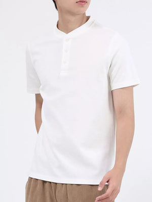 White cotton casual Henley t-shirt with button placket and mandarin collar.