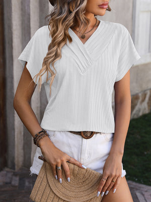 White textured V-neck tee with short sleeves and a surplice detail.