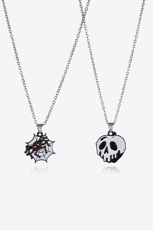 Spooky Season enamel pendant set with spiderweb and skull charms on silver chains.