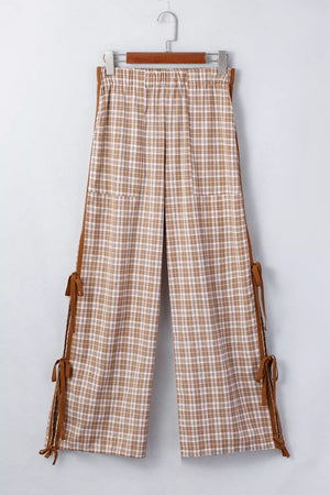 Plaid print casual pants with drawstring waist and side tie details.