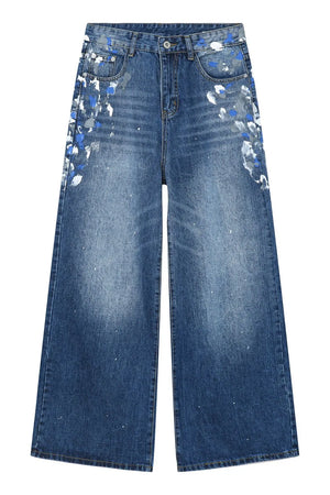 Painterly Wash Wide Leg Jeans in medium wash denim with artistic blue and white brushstroke details.