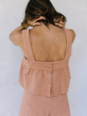 Watermelon pink linen crop top with button back detail and culottes.