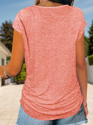 Burnt Coral cap-sleeve tee with ruched sides and a curved hem.