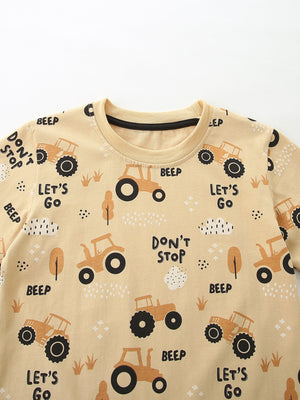 Toddler beige cotton t-shirt with playful tractor print and text details.