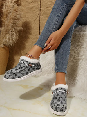 Gray Southwestern print faux fur lined loafers with white laces and gold ankle chain.