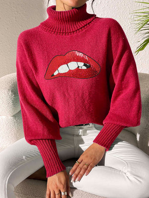 Sequin lip turtleneck sweater in deep red with balloon sleeves.