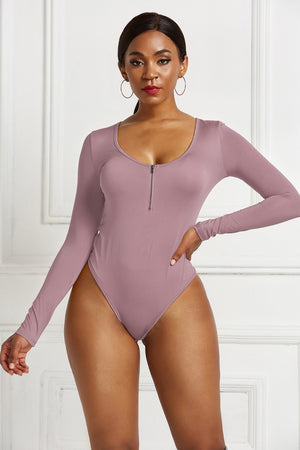 Dusty Pink long sleeve bodysuit with plunge neckline and zip front detail.