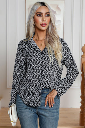 Black and white monogram print collared button-up blouse with long sleeves.