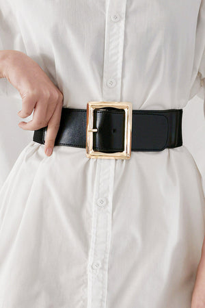 Black elastic belt with a large gold sculptural buckle, adjustable.