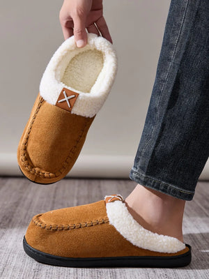 Caramel suede moccasin slides with white shearling lining and leather accent.