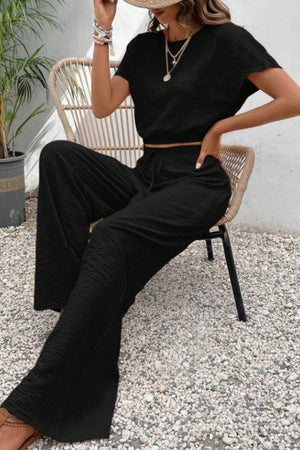 Black textured crop top and wide-leg trousers set with drawstring waist