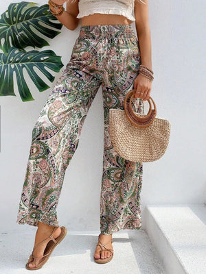 Paisley palazzo trousers with drawstring waist in multicolor, featuring a wide leg and boho print.